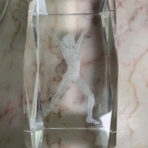 Clear crystal paperweight with gymnastics figure inside